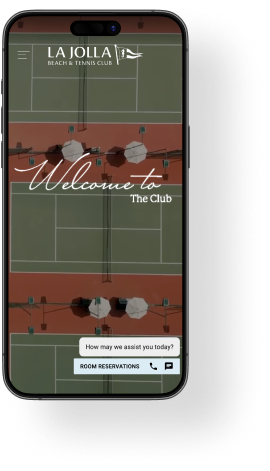 A mobile phone showing the home screen of La Jolla's website, featuring a top-down shot of the resort's tennis court.